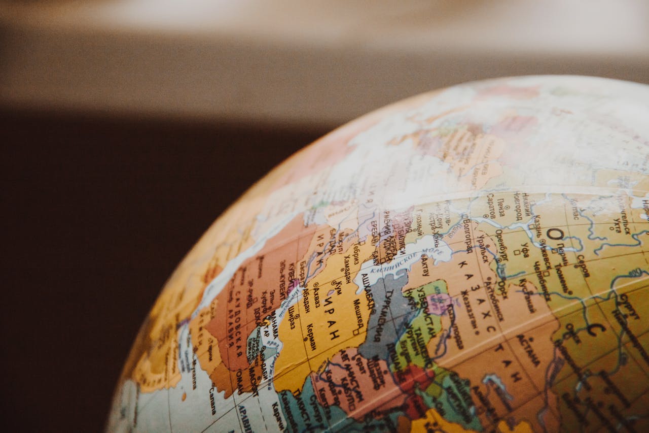 why-choose-us Detailed close-up of a globe showcasing parts of Europe and Asia for world exploration concepts.